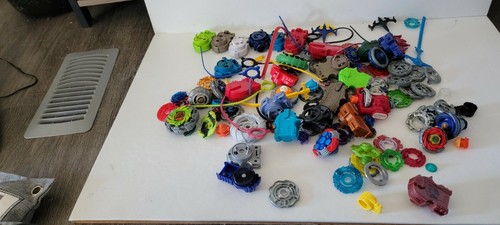 Lotto ricambi beyblade - ricambi,