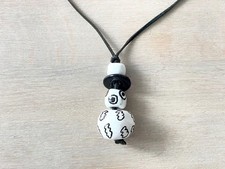 Collana di perle in ceramica