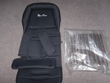 Carrozzina con croce in