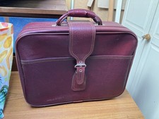 Piccola valigia rossa vintage