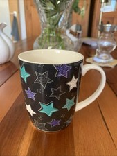 Royal Tasse Porzellan Tasse /Henkel ,Sternmotiv mehrfarbig,Ø8cm.x10cm.H