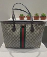 Shopping Gucci Ophidia in tela GG Supreme beige ed ebano con finiture in pelle 