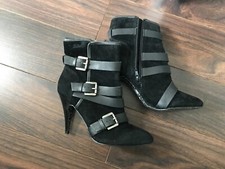 Stivali neri con zip laterale