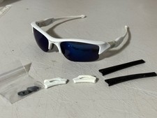 Occhiali da sole Oakley Flak Jacket bianchi con lenti ICE Iridium XLJ (+ gomme)