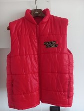 🧥 PIUMINO ROSSO SMANICATO