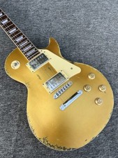 Vendita calda chitarra elettrica corpo mogano colore oro superiore finitura vernice nitrocellulosa