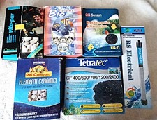 LOTTO ACCESSORI PER ACQUARIO: RISCALDATORE, ELEMENTI CERAMICI, CARBONIO ATTIVO