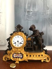 PENDULE A DEUX PATINES