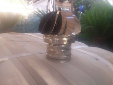 Comignolo rotante in acciaio