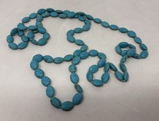 Collana lunga con perline di