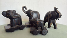 4 ELEFANTI INDIANI IN LEGNO INTAGLIATO CON ROTELLE VINTAGE