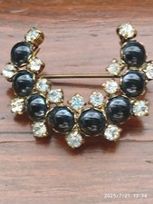 SPILLA MEZZA LUNA BASE METALLO