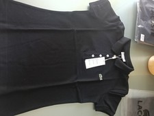 Polo Femminile Lacoste. Colore