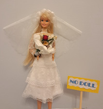 Abito da sposa, velo e Bouquet