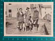 FOTO UOMINI CACCIATORI CON