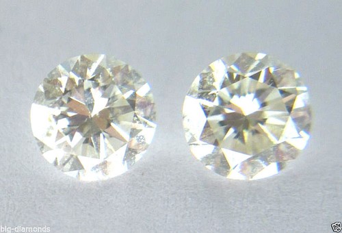 Coppia diamanti solitari - di,