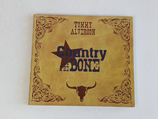 COUNTRY TO THE BONE Tommy