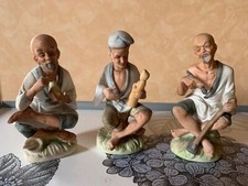 Tre statuine in porcellana