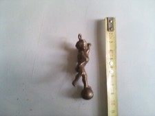 Scultura ottone pesante - in,