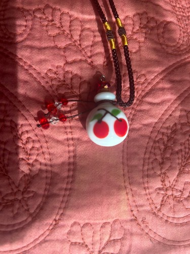Collana bottiglia profumo