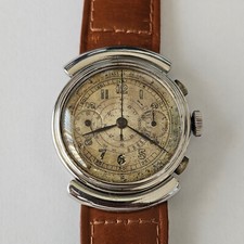 UNVER-CRONO-ACCIAIO-RUOTA A COLONNE-ANSE FISSE-"DISCO VOLANTE"-LANDERON 13-RARO