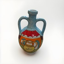 Brocca olio firmata Nino