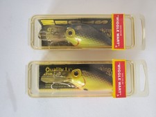 Two Vintage Pre Rapala Storm