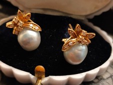 paio di orecchini oro diamanti