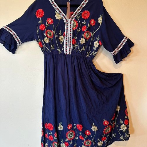 Abito blu navy ricamato