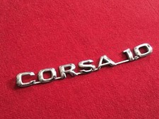 OPEL CORSA 1.0 LOGO SIGLA EMBLEMA FREGIO STEMMA SCRITTA TARGHETTA BADGE PLACCA