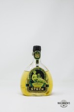 Acquavite dorata stock con - dorata,