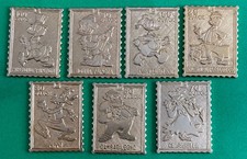 7 Francobolli in metallo 50°