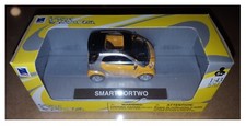 Smart ForTwo gialla arancio modellismo NEW RAY 1:43 City Cruiser die cast metal