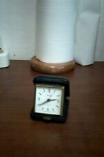 vecchia sveglia da camera o da viaggio marca SWIZA made in svizzera funzionante 