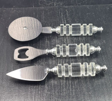 set 3 attrezzi linea cucina metallo con manici in cristallo ***
