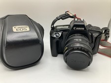 Canon Eos 650 fotocamera reflex 35 mm, obiettivo zoom Canon 35-70, custodia, pellicola interna, ottime condizioni