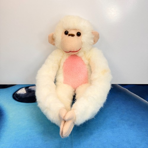Scimmia bianca peluche pancia