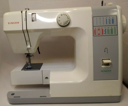 Singer sewing machine model - machine,