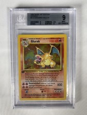 Pokémon - Charizard Prima Edizione DE (1999) Holo - Beckett 9 Mint
