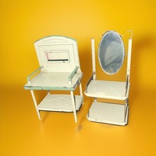 Giocattoli per casa di bambole