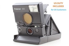 Fotocamera reflex pellicola istantanea Polaroid 690 testata con pellicola CLA...