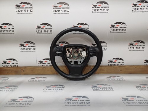 Volante in pelle nera - in,