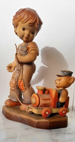 Statuina legno scolpito marca