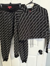 Tuta donna Guess con logo