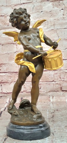 Scultura batterista putti