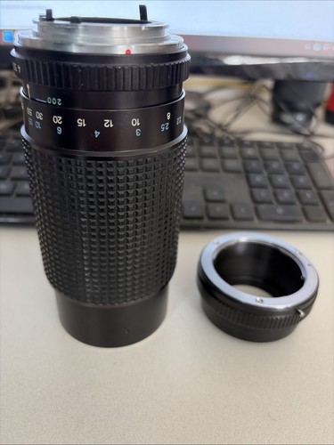 Tokina 200 con - 80-200, f4
