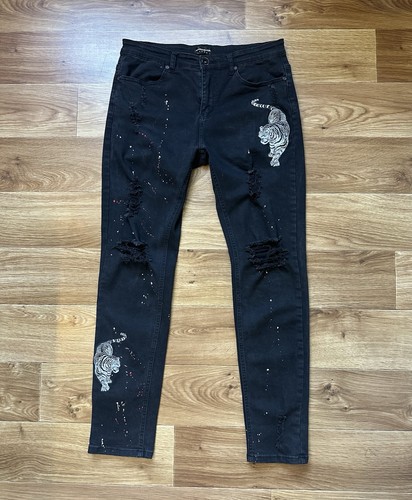 Jeans skinny neri invecchiati