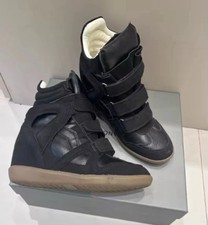 Sneakers con zeppa di alta