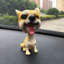 Carino Bobble Head annuire