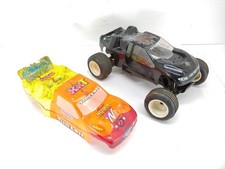 Raro telaio a rulli Kyosho Outrage ST-2 1/10 2wd Stadium Truck 1998 usato